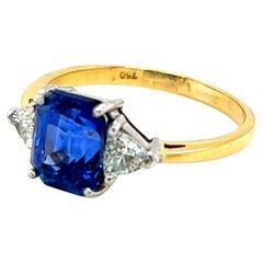 3.07 Carat Emerald cut Blue Sapphire and Diamond Ring in 18 Karat Yellow Gold