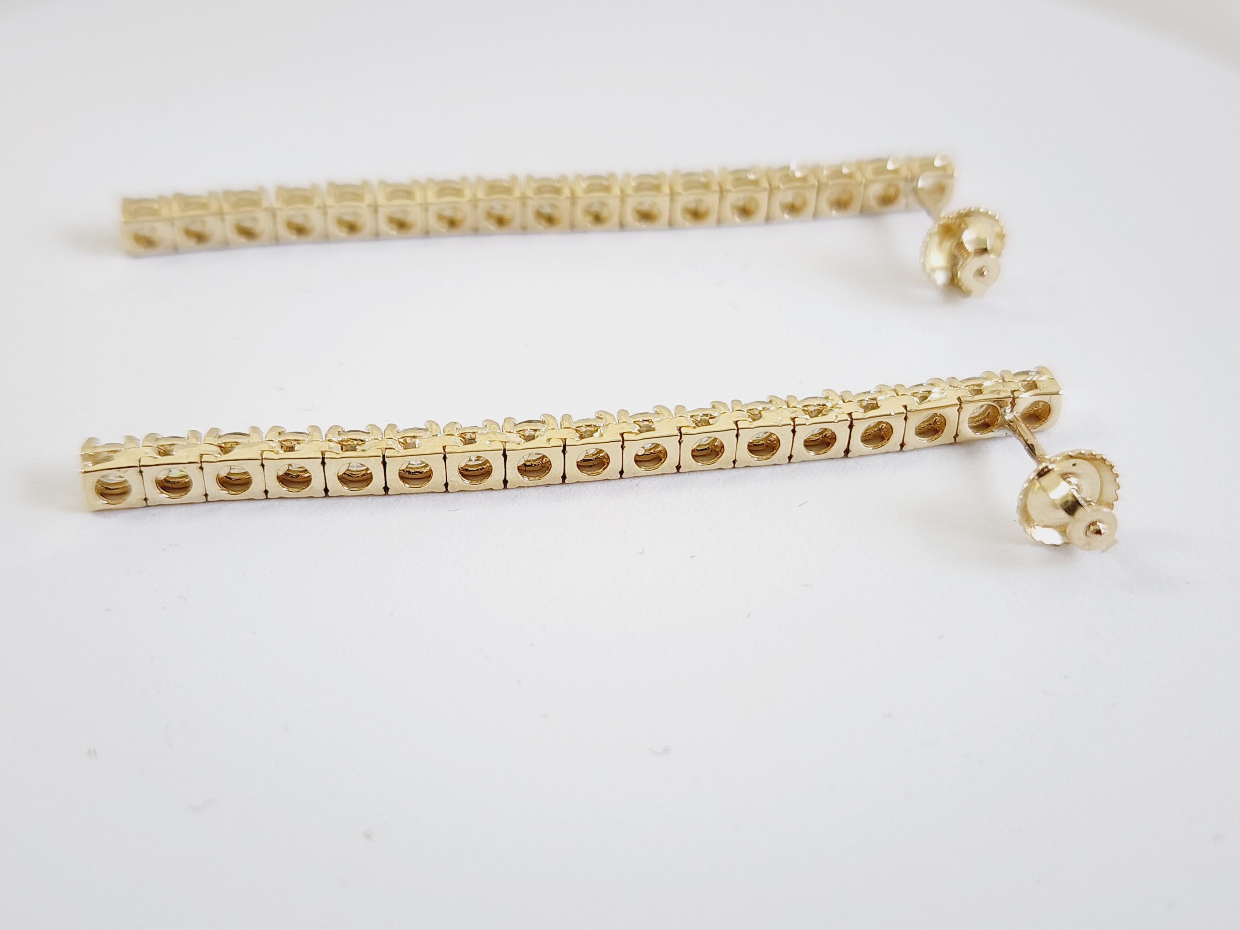 Tennis Earrings Italian made 14K yellow gold.
The total weight is 3.07 carats. Beautiful shiny natural diamonds.
The total length is 2 inch drop. screw back setting for secure wear.

*Free shipping within the U.S.*