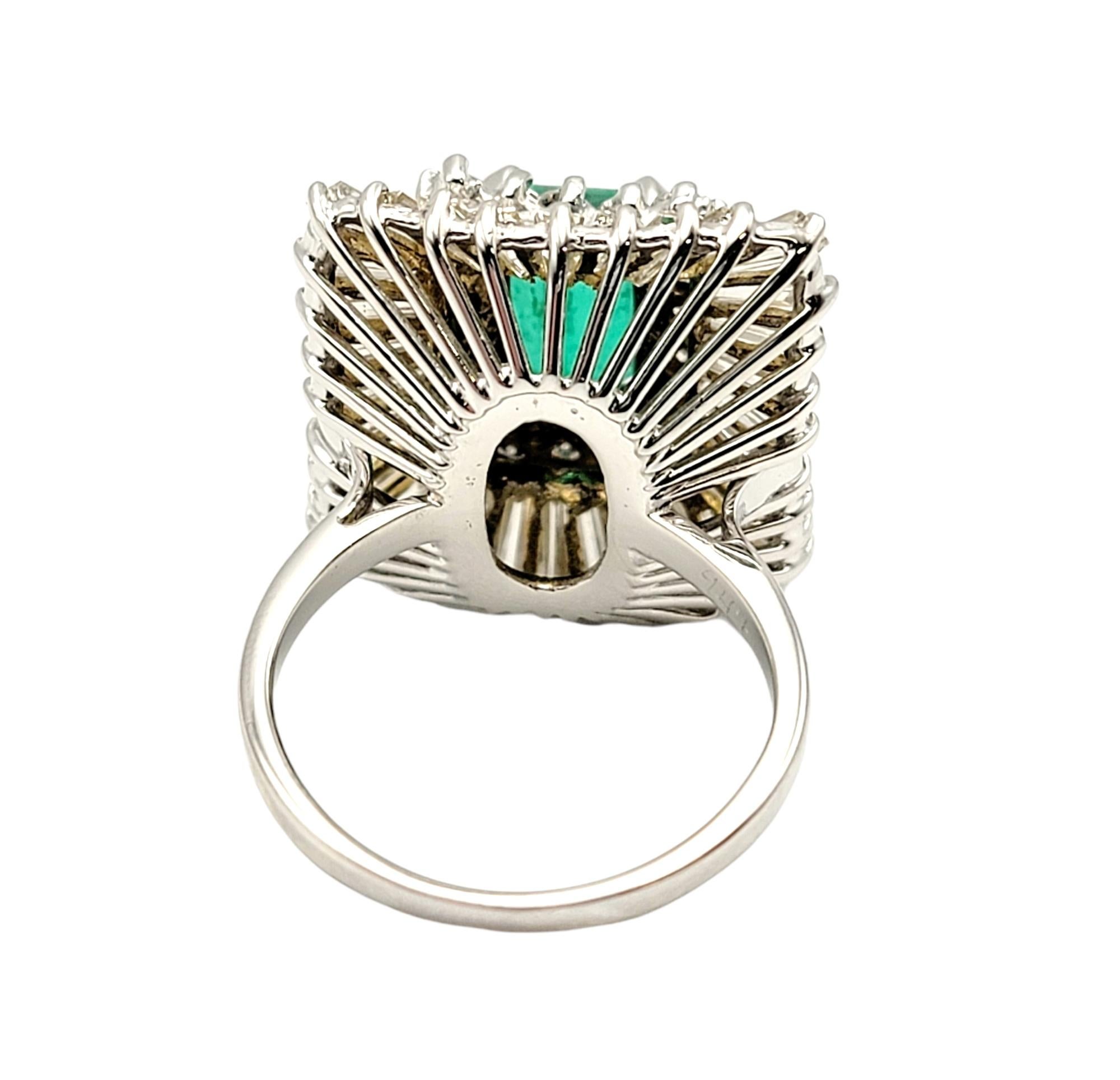 Women's 3.07 Carats Total Emerald Cut Emerald and Diamond Cocktail Ring 14 Karat Gold For Sale
