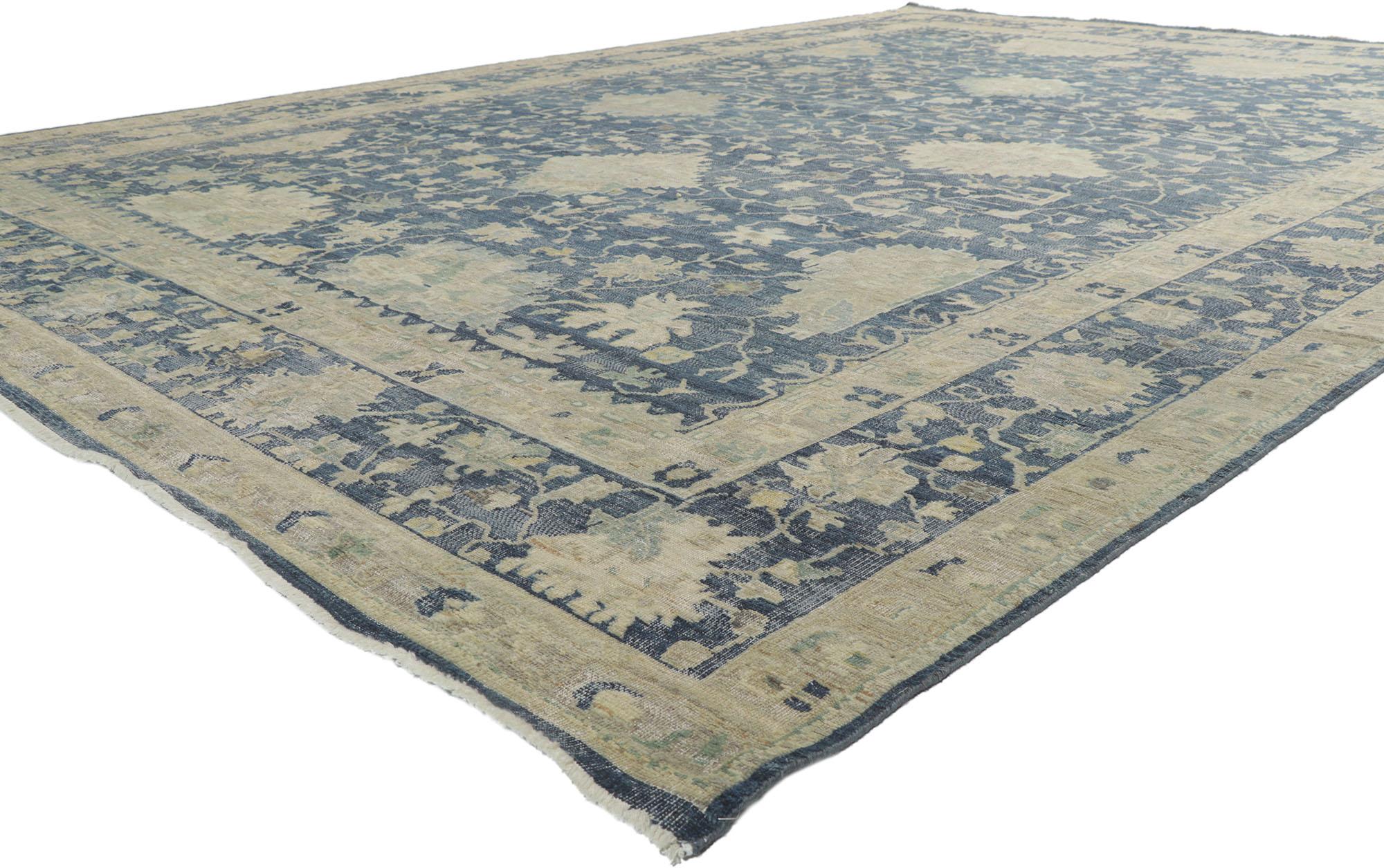 30711 new Contemporary distressed rug, 09'08 x 13'09. With its blue hues and weathered beauty, this new contemporary distressed rug creates an inimitable warmth and calming ambiance. The geometric botanical pattern and rich waves of abrash woven