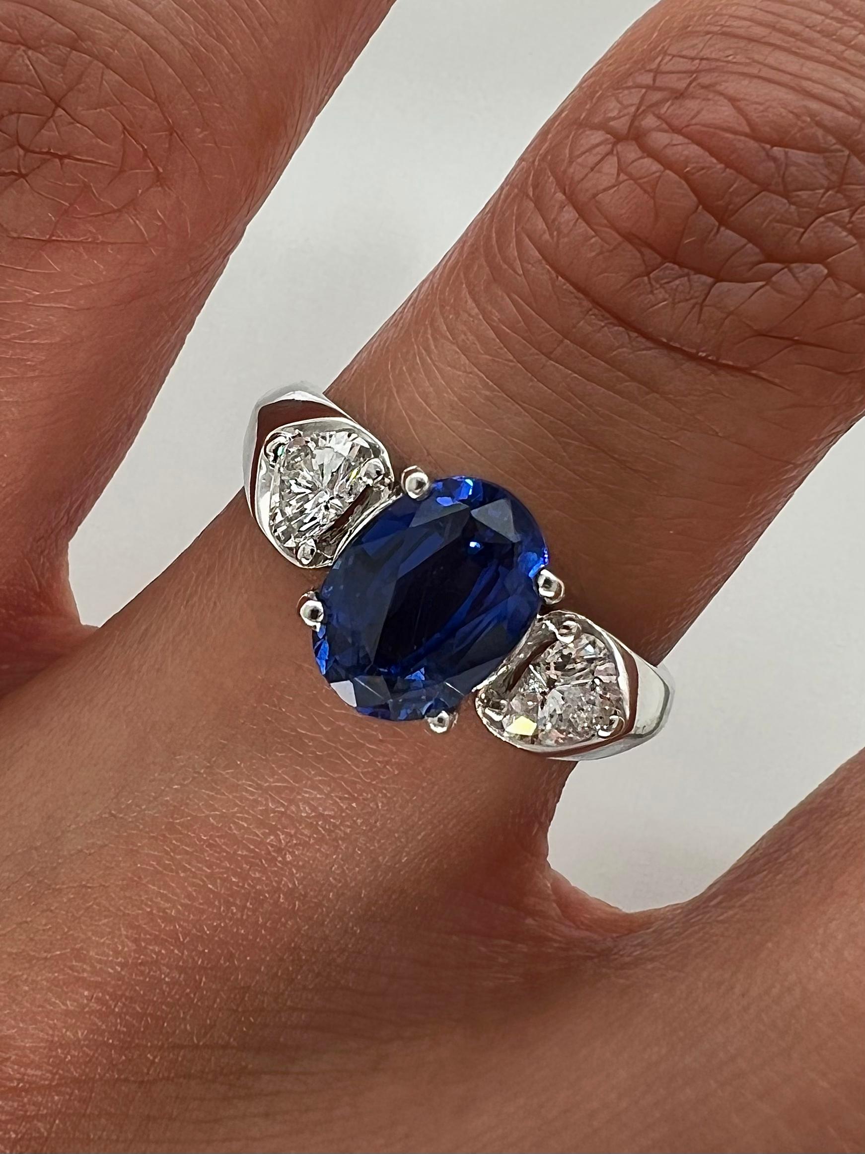 Oval Cut 3.07 Total Carat Blue Sapphire and Diamond Engagement Ring For Sale