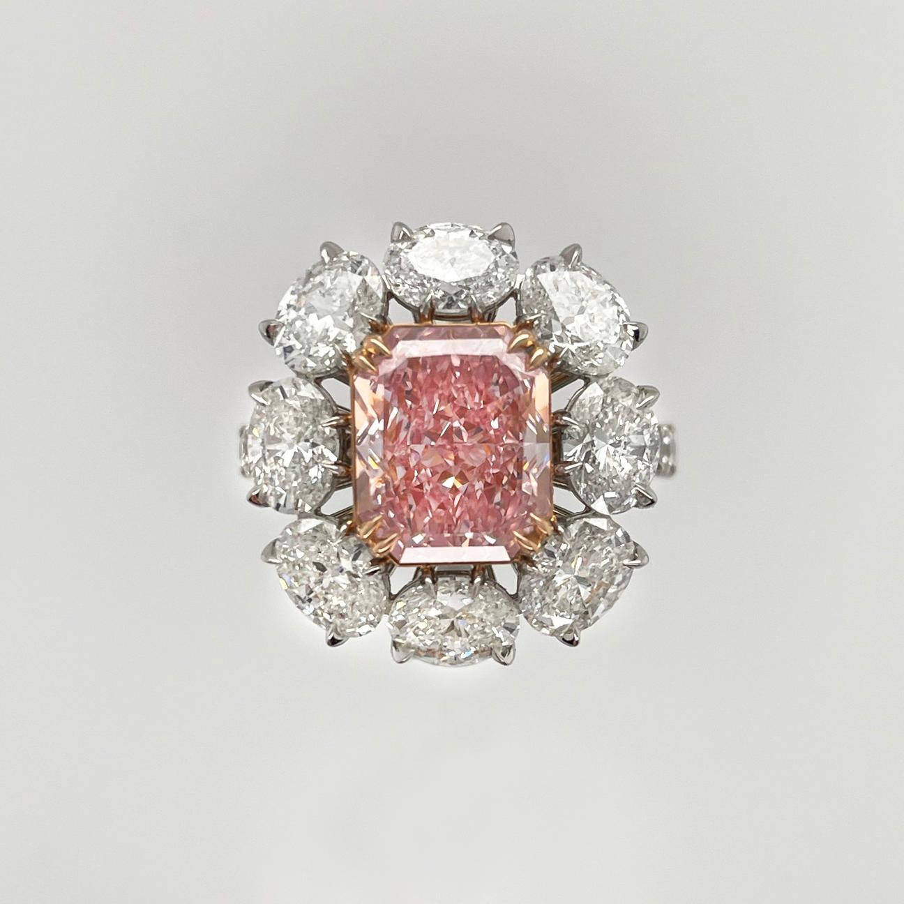 Pink diamonds gain their highly desirable color as a result of a rare, naturally occurring slippage of the crystal lattice in the stone while it is forming deep within the Earth’s crust. 

Radiant Cut Diamonds have a combination of the stylish lines