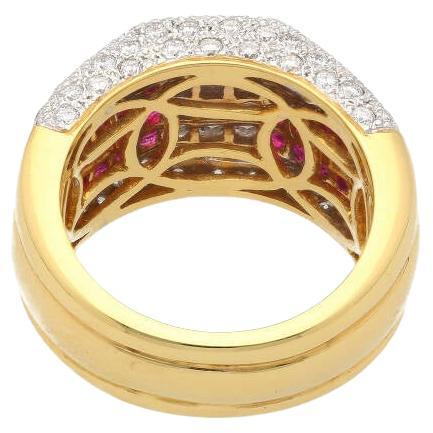 3.08CTW Ruby and Diamond Cluster Band Ring in 18K Yellow & White Gold. This piece features 30 princess cut rubies arranged in a captivating cluster design, elegantly adorning a size 6 band ring, creating a radiant display of ruby and diamond