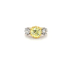3.08 Fancy Yellow Cushion Brilliant Cut Diamond and Old Euro Cut Diamond Ring