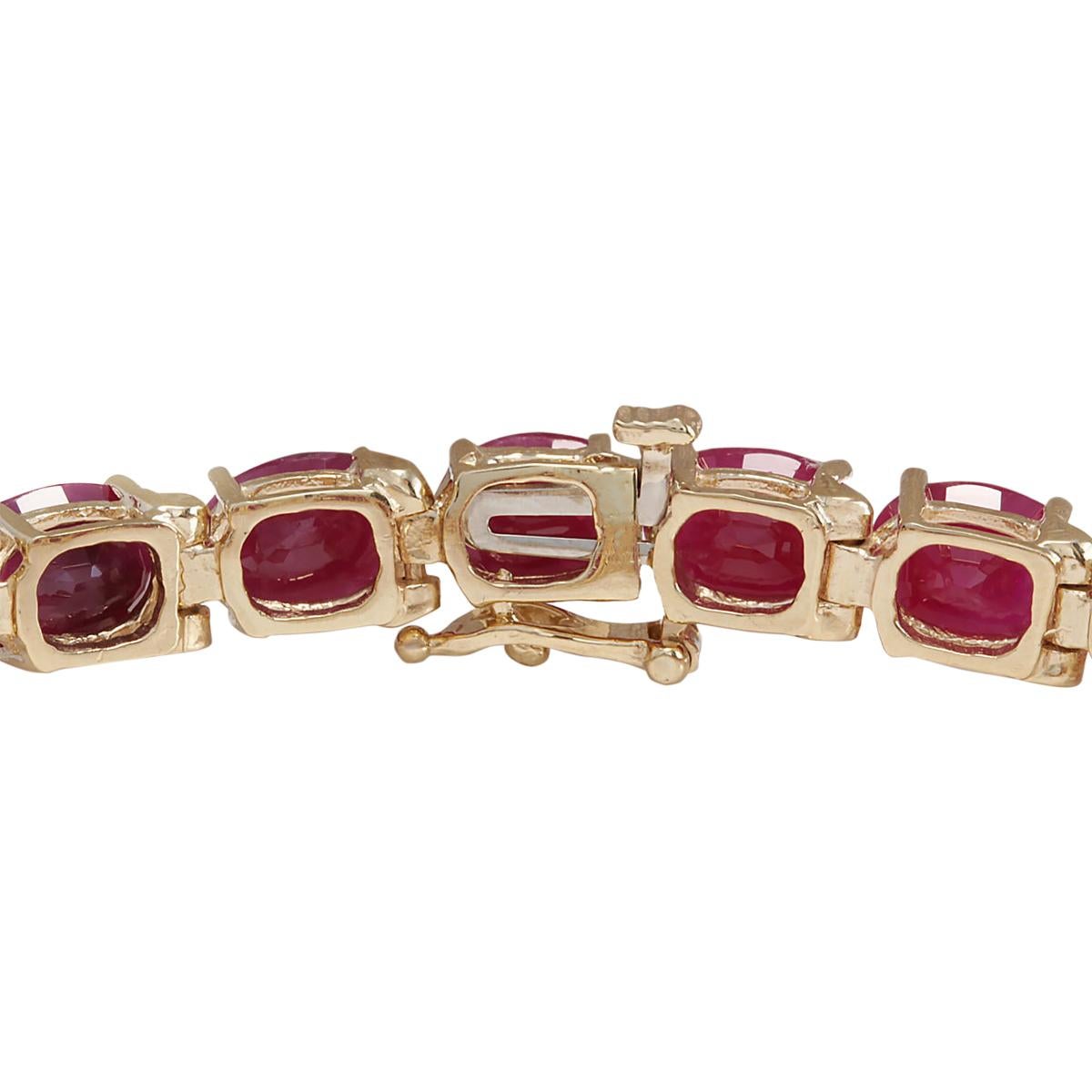 30.89 Carat Ruby 14 Karat Yellow Gold Bracelet
Stamped: 14K Yellow Gold
Total Bracelet Weight: 14.0 Grams
Bracelet Length: 7 Inches
Bracelet Width: 6.00 mm
Total  Ruby Weight is 30.89 Carat (Measures: 8.00x6.00 mm)
Color: Red
Sku: [703725W]