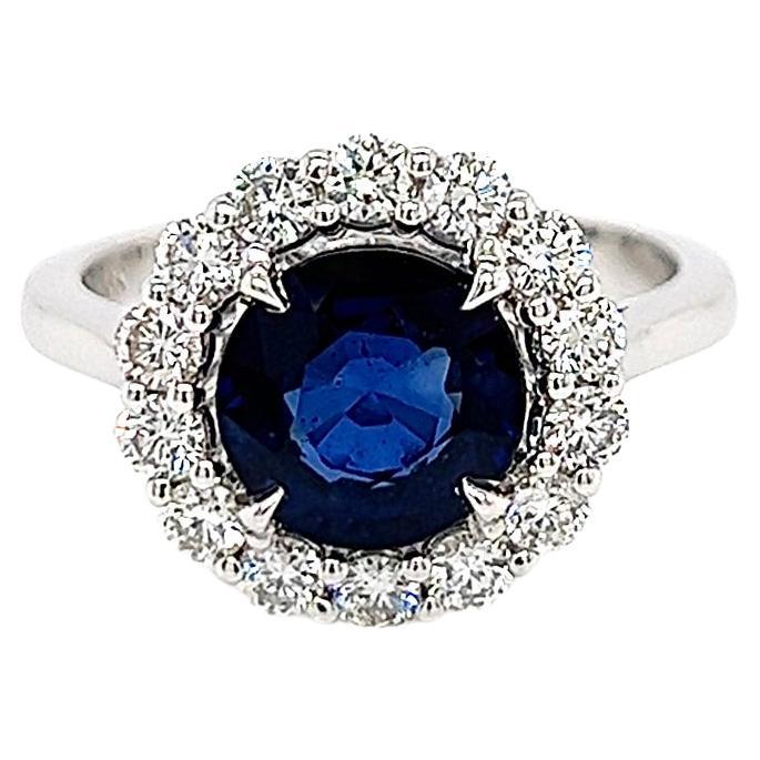3.08 Total Carat Blue Round Sapphire and Diamond Halo Ladies Engagement Ring For Sale
