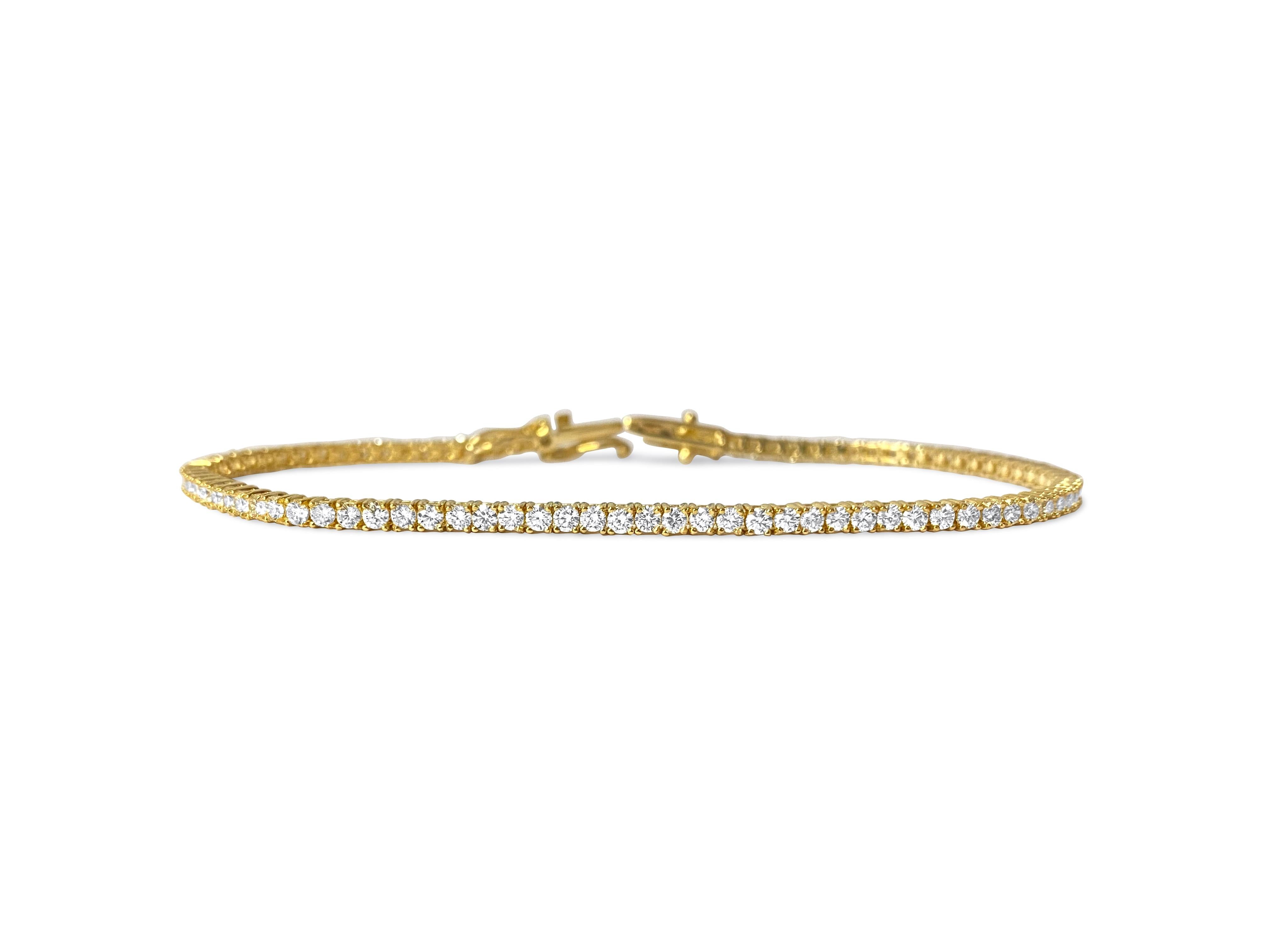Metal: 10k yellow gold. 
Diamonds: 3.08cwt. 
VVS clarity. H color. 100% natural earth mined diamonds. Round brilliant cut set in prongs. Gorgeous finish and shine. Top of the line unisex diamond tennis bracelet.