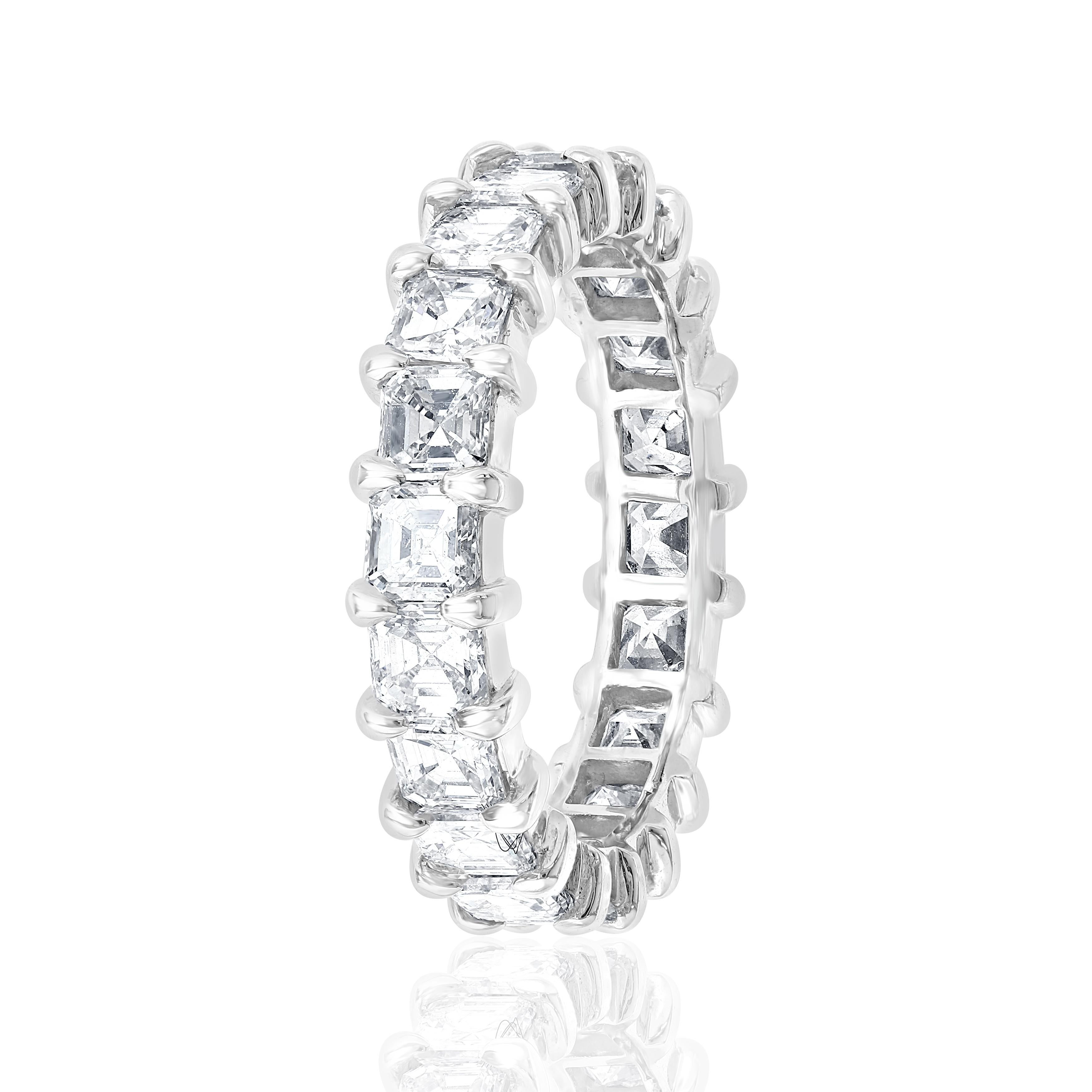 This Beautiful Eternity Band is set with 20 perfectly matched Asscher Cut Diamonds, each weighing over 0.15ct for a total of 3.09Carats. Each stone is of F-G color and VVS-VS clarity. Made in New York City using 18 Karat White Gold. Fits US Size