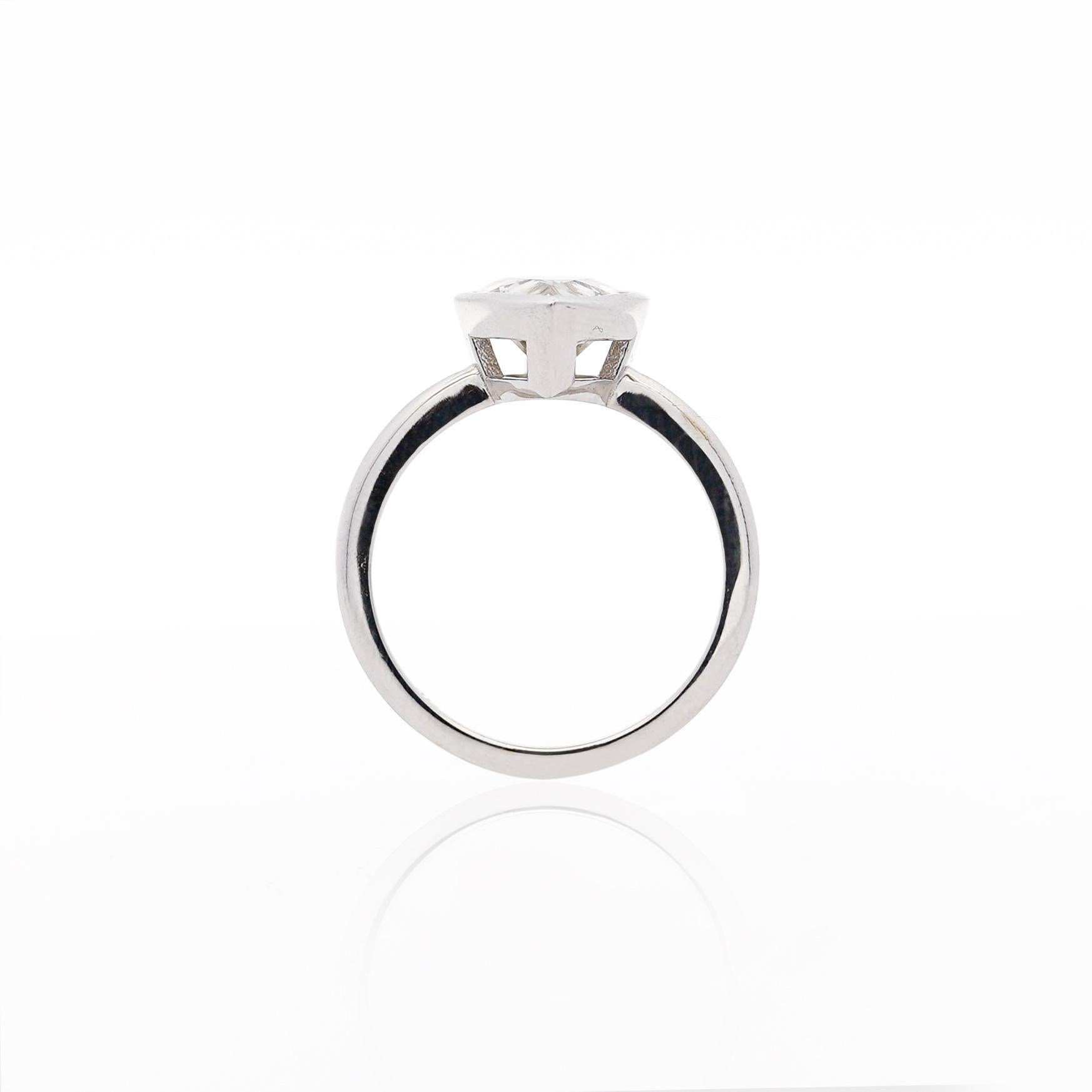 Simplistic and conspicuously valuable. This natural diamond of 3.09 carat is securely bezel set with a straight shank solitaire setting. Set in a sleek 14K white gold —effortlessly modern with timeless appeal.

Details:
Item Type: Engagement