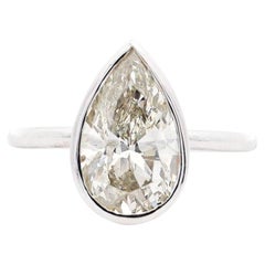 Bague de fiançailles solitaire en or blanc 3,09 carats diamants taille poire avec chaton