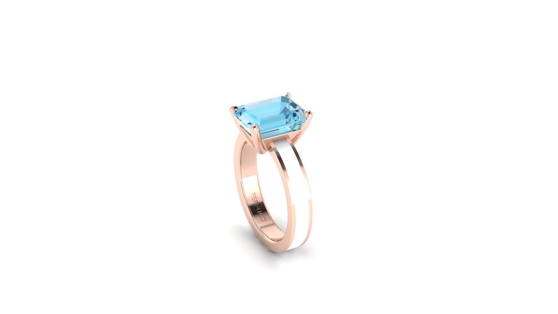 3.09 carats naturalAquamarine, emerald cut, very high quality color, eye clean gem and intense color, set in an 18k rose gold ring with white enamel eternity coated, manufactured with the best Italian manufacturing.
The ring size is 6, adjustable