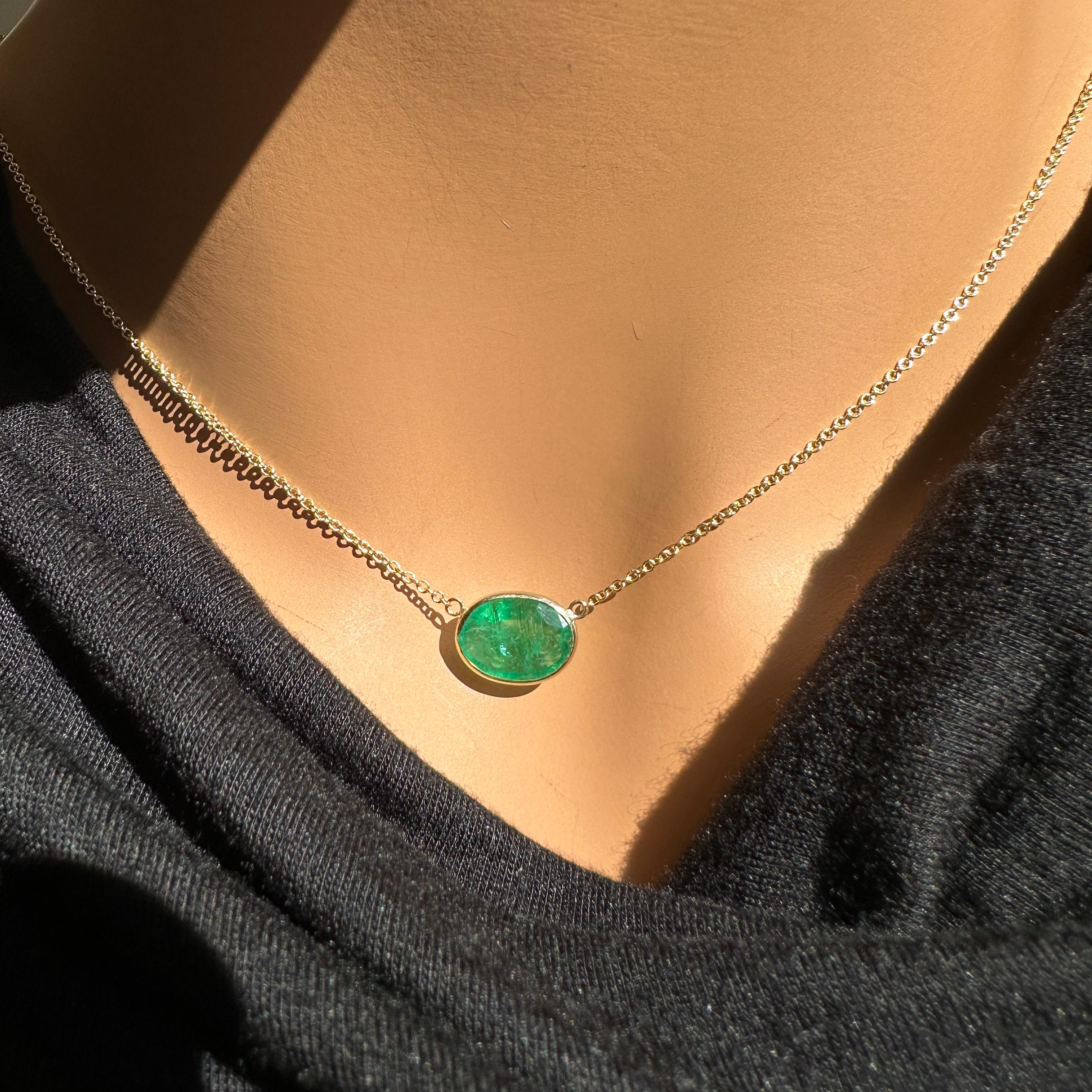A fashion necklace crafted in 14k yellow gold with a main stone of an oval-cut emerald weighing 3.09 carats would be a stunning and luxurious choice. Emeralds are known for their captivating green color and timeless elegance, and the oval cut adds a