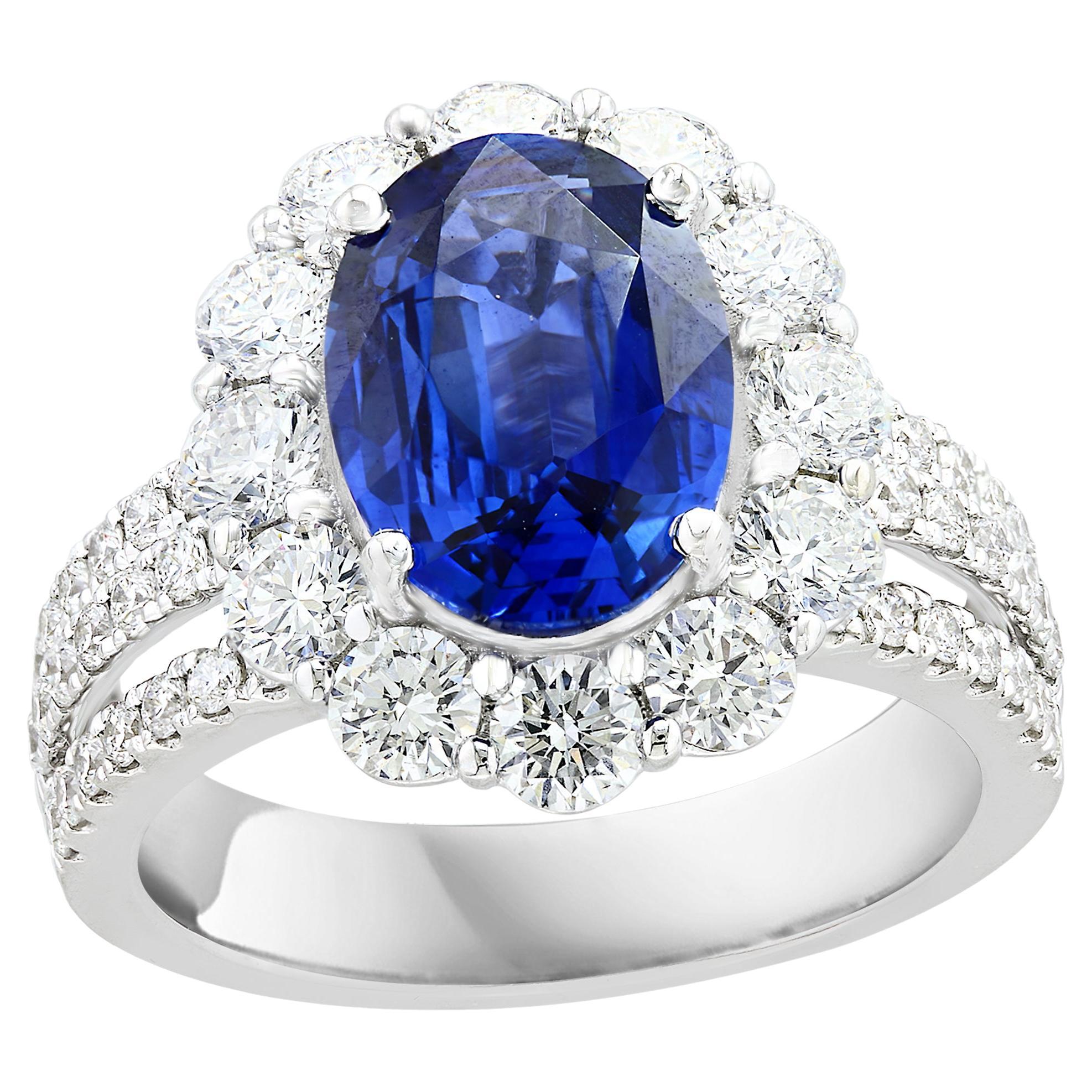 3.09 Carat Oval Shape Blue Sapphire and Diamond Flower Ring in 18K White Gold For Sale
