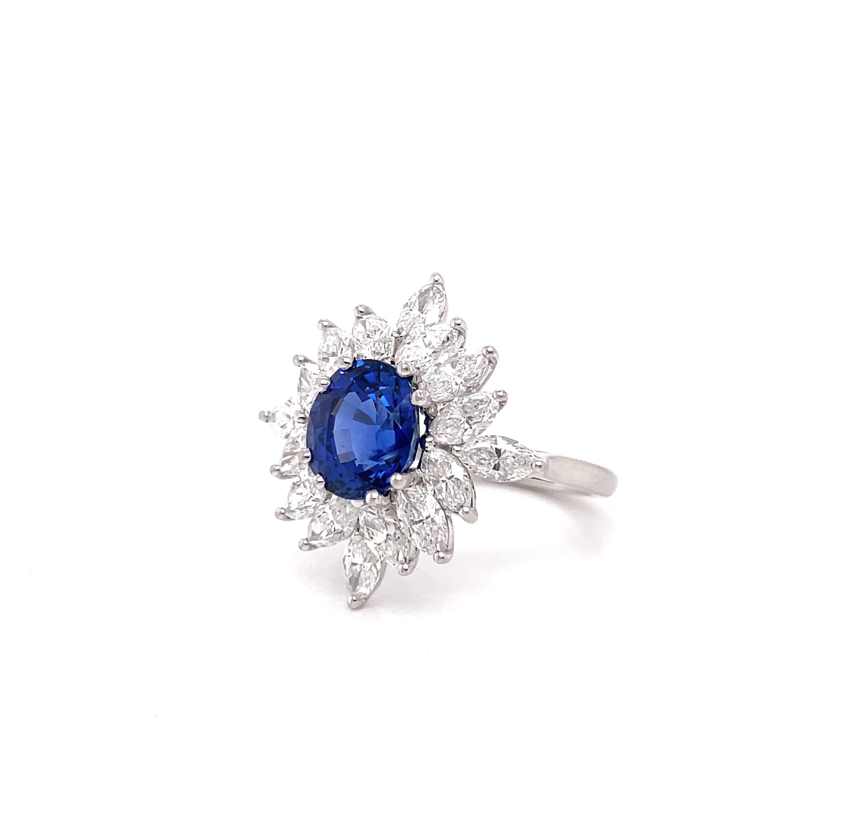 Modern 3.09 Carat Royal Blue Oval Sapphire and Diamond Platinum Cluster Ring, 1984 For Sale