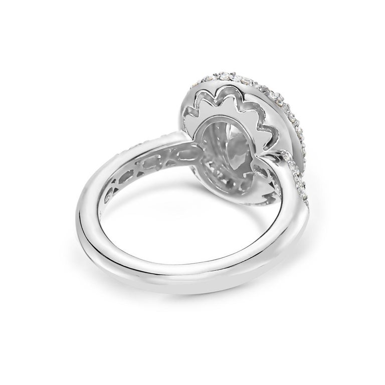 3.09 Carat Yellow Diamond Oval Halo Setting Engagement Ring For Sale at 1stdibs