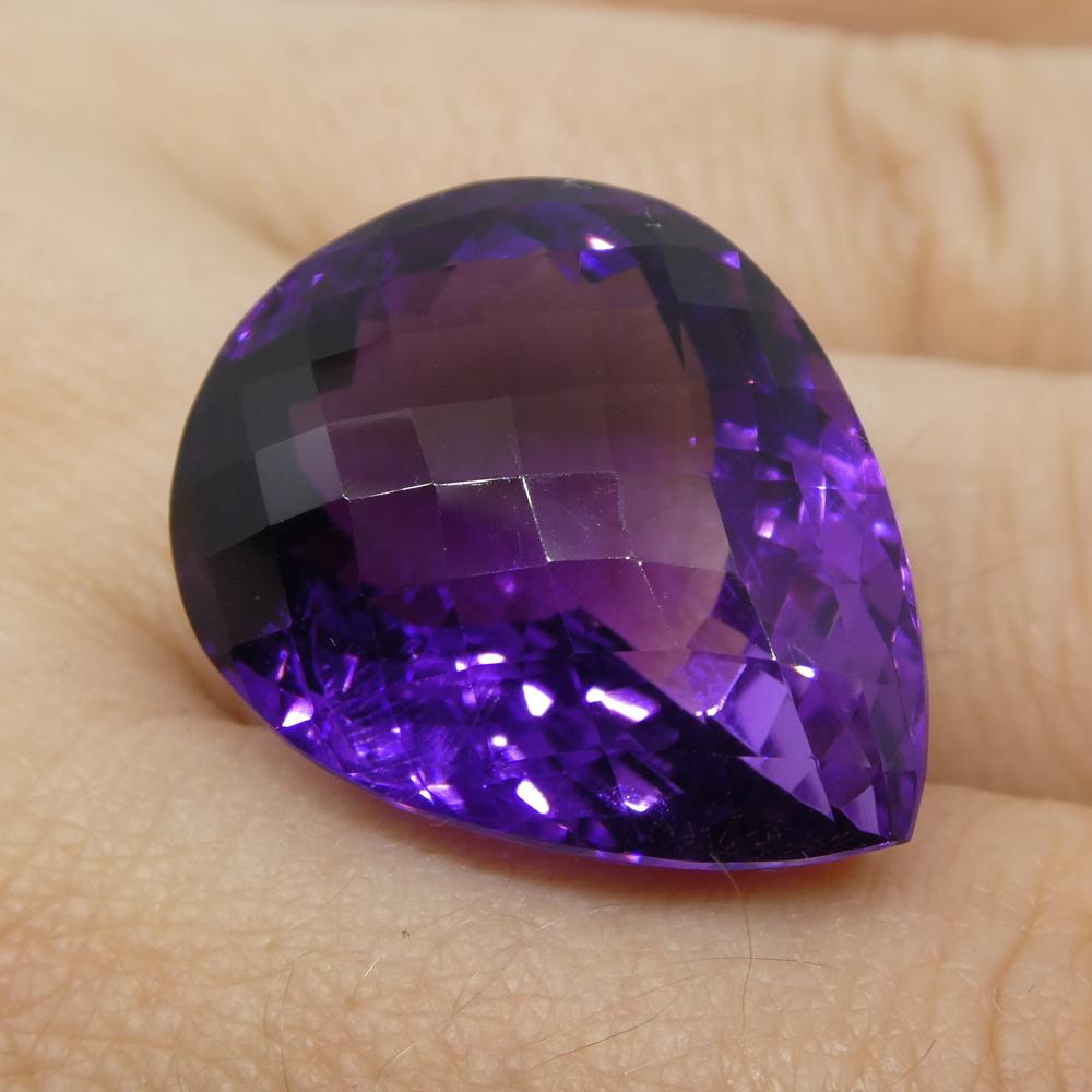 Description:

Gem Type: Amethyst
Number of Stones: 1
Weight: 30.9 cts
Measurements: 20.40x18x13 mm
Shape: Pear Checkerboard
Cutting Style Crown: Checkerboard
Cutting Style Pavilion: Modified Brilliant
Transparency: Transparent
Clarity: Very Slightly