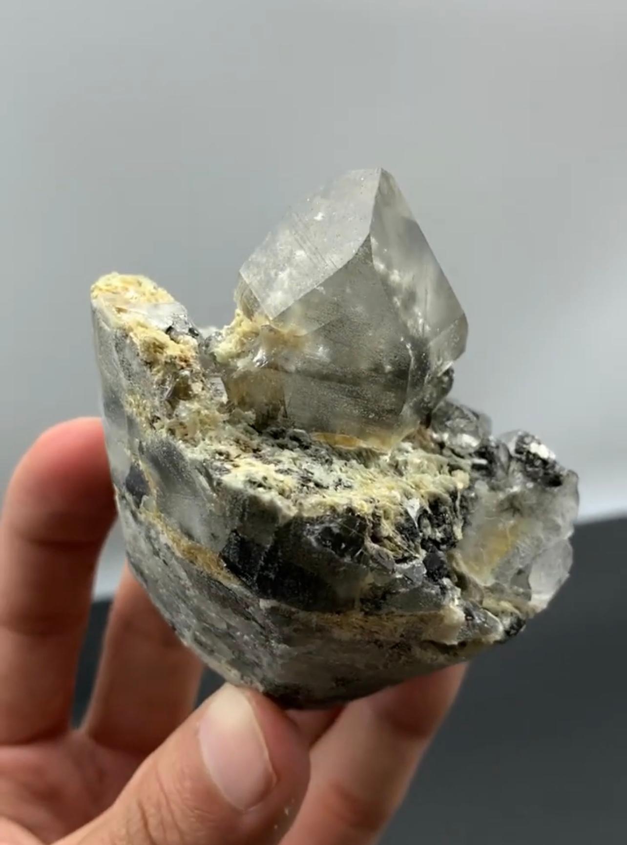 Product Information:

Specimen Type: Rutile Quartz On Matrix

Weight: 309 grams

Dimension: H: 7.5 x W: 7.7 x D: 4.5 cm

Origin: Skardu District, Gilgit Baltistan, Pakistan

Treatment: None

Description: 

This exquisite specimen features a pointed,