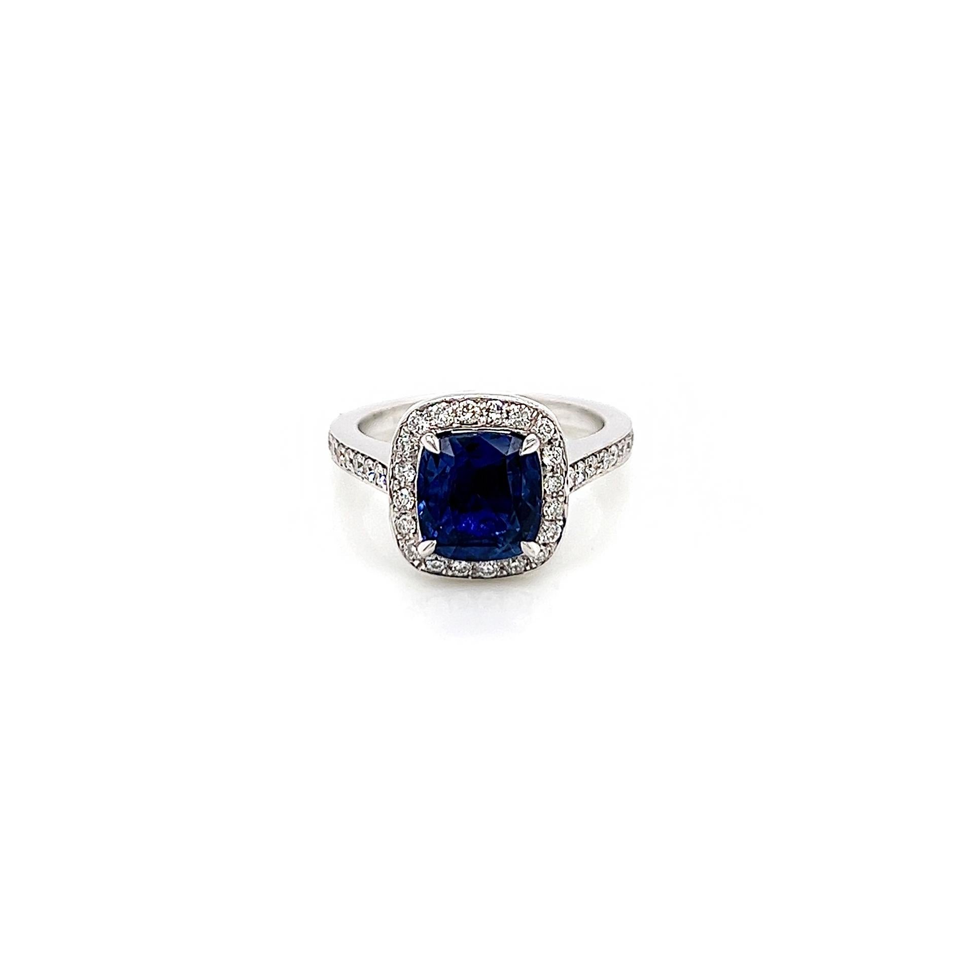 3.09 Total Carat No Heat  Sapphire and Diamond Halo Pave-Set Ladies Ring. GIA Certified.

-Metal Type: 18K White Gold
-2.42 Carat Cushion Cut Natural No Heat  Sapphire, GIA Certified 
-Sapphire Color: Blue 
-Sapphire Measurements: 7.52 x 7.17 x 4.47