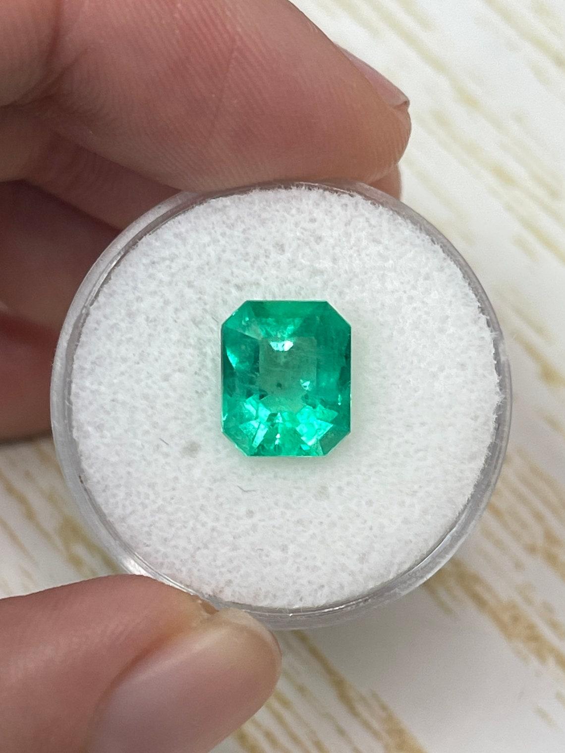 Stone: Emerald
Weight: 3.09-carats
Shape: Emerald Cut
Clarity: Transparent
Luster: Very Good
Color: Muzo Yellowish Green
Measurements: 9.87mm x 8.08mm x 6.15mm
Geographic Origin: Colombia
Treatment: Natural, Oiling

Comments: Due to their growth