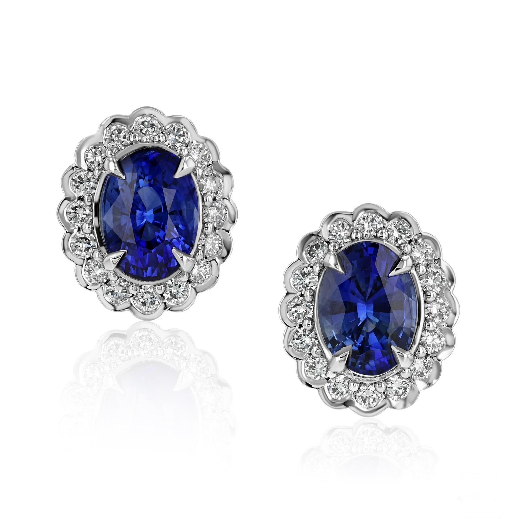 Platinum earrings, featuring 3.09 cts of GIA certified Ceylon sapphires highlighted by round diamonds totaling 0.54 cts. 