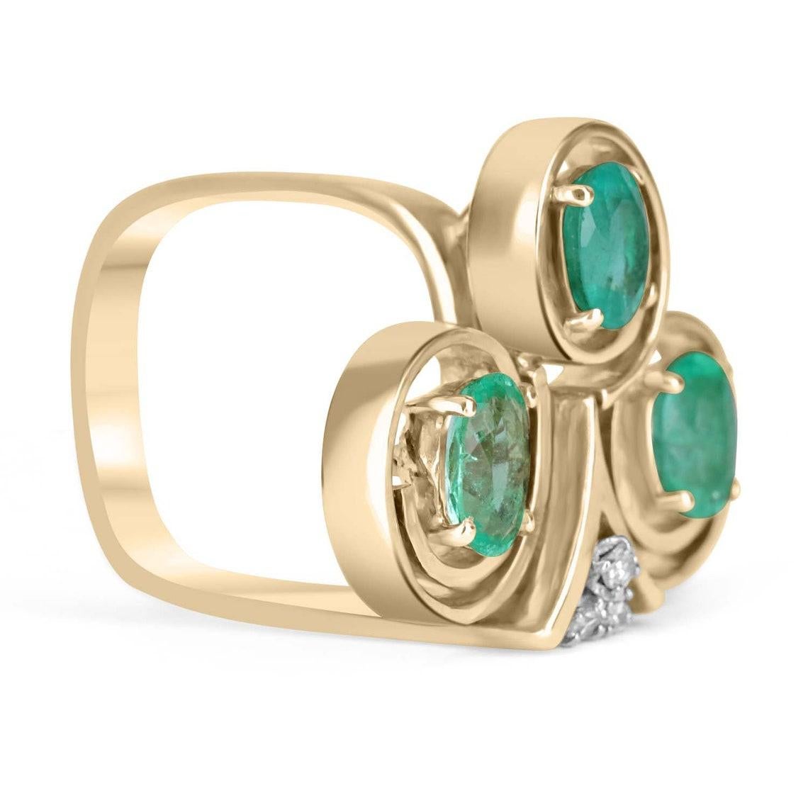 A conversational, statement piece made with natural Colombian emeralds and step-cut old diamonds. A unique custom-created handmade ring estimated to be dated around the 1910s Art Nouveau era. Dexterously crafted in gleaming 14K yellow gold, this