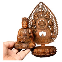 Buddha Guan Yin mobile intagliato in legno di 30 cm seduto su un loto
