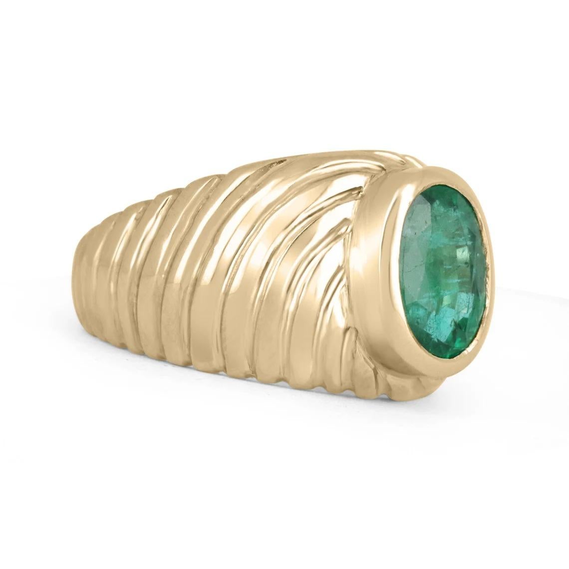 A custom-made, men's natural emerald solitaire ring made in 14K yellow gold. The earth-mined oval cut Zambian emerald is natural, and fine quality; with excellent luster and unique characteristics. The emerald is bezel set in a secure golden frame,