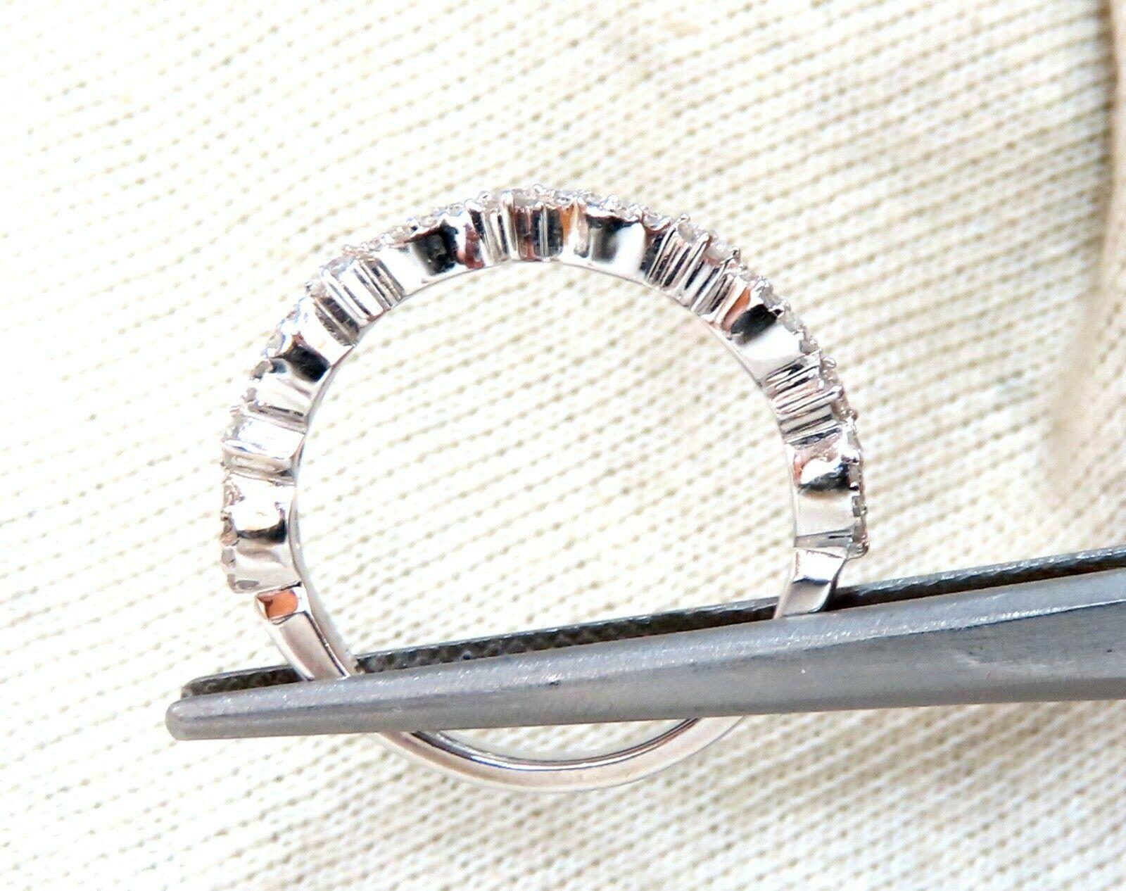 Thin Band, Flat profile.

.30ct Natural Diamonds

 Full cut, Rounds 

H color, clarity

14kt. white gold

6.2 Grams

2.5mm wide (top diamond rows)

3mm depth

current size: 7.25

We may resize (please inquire).