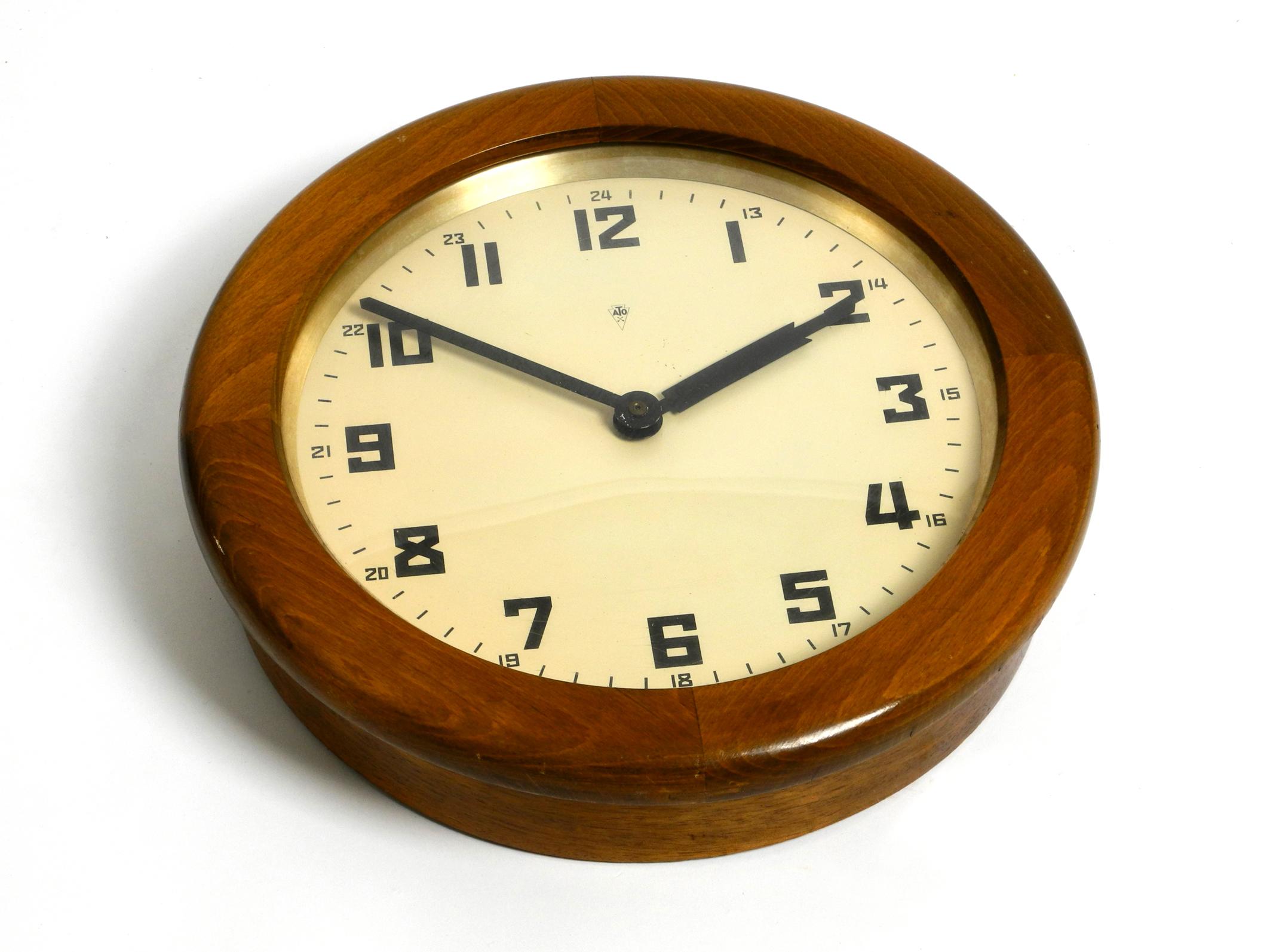 30s ATO wall clock made of oak by the HamburgAmerican clock factory