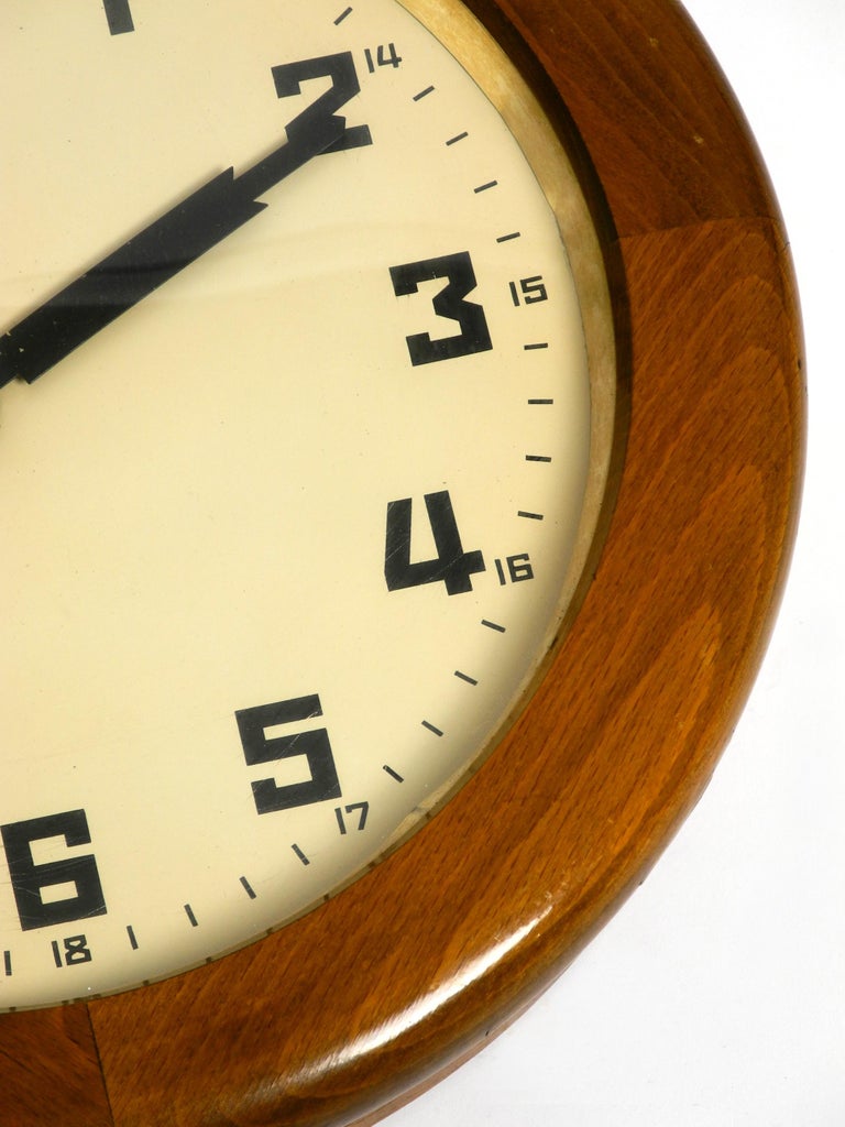 30s ATO wall clock made of oak by the HamburgAmerican clock factory