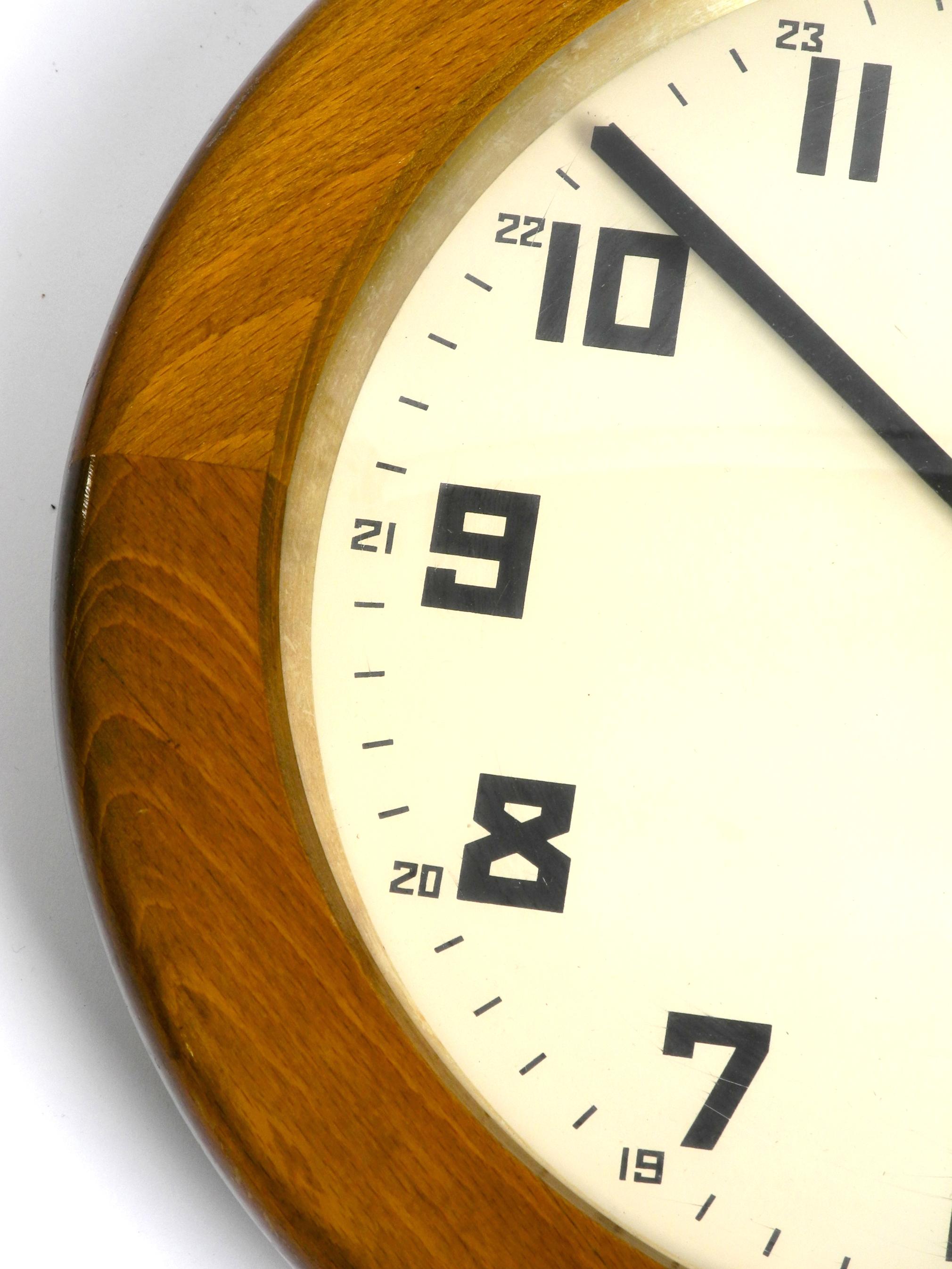 30s ATO wall clock made of oak by the HamburgAmerican clock factory