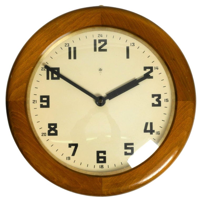 30s ATO wall clock made of oak by the HamburgAmerican clock factory