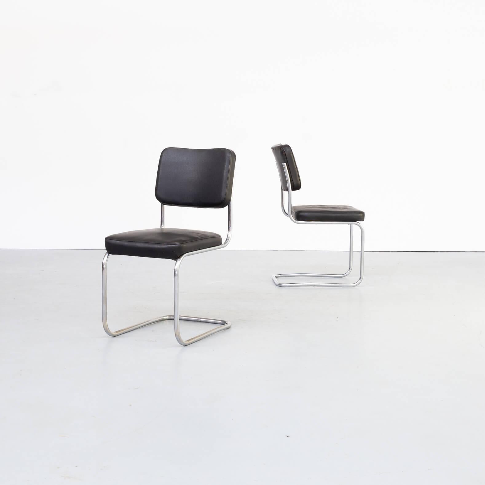 Set of 2 Mart Stam side chairs with black skai finish. Classic chrome cantilever frames.