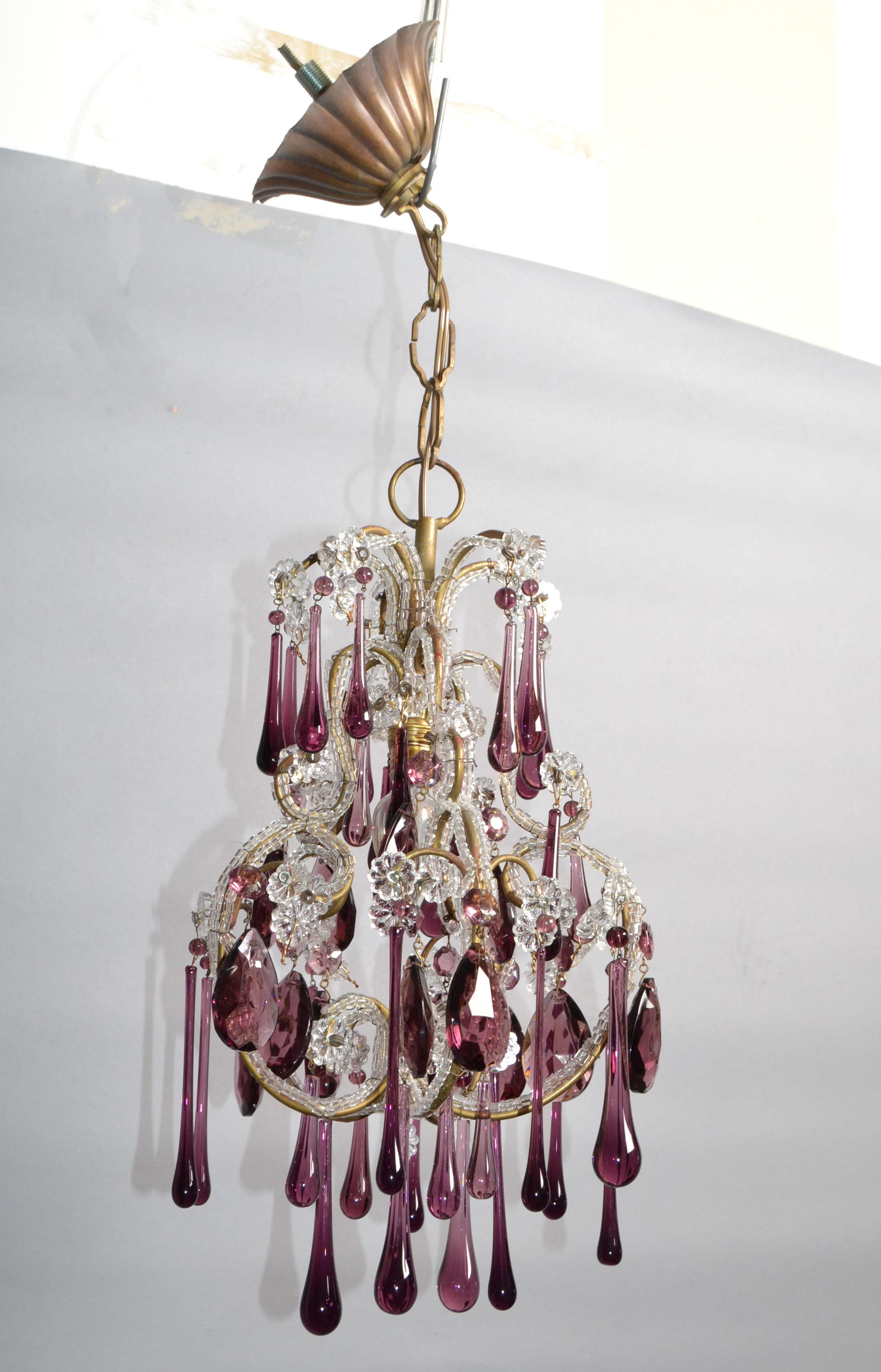 1930's French Petite chandelier 1 light, brass arms crystals beading and with bulbous Purple blown glass drops with clear glass flowers & beads to match above.
US rewiring and takes one candelabra light bulb with max. 60watts.
Comes with original