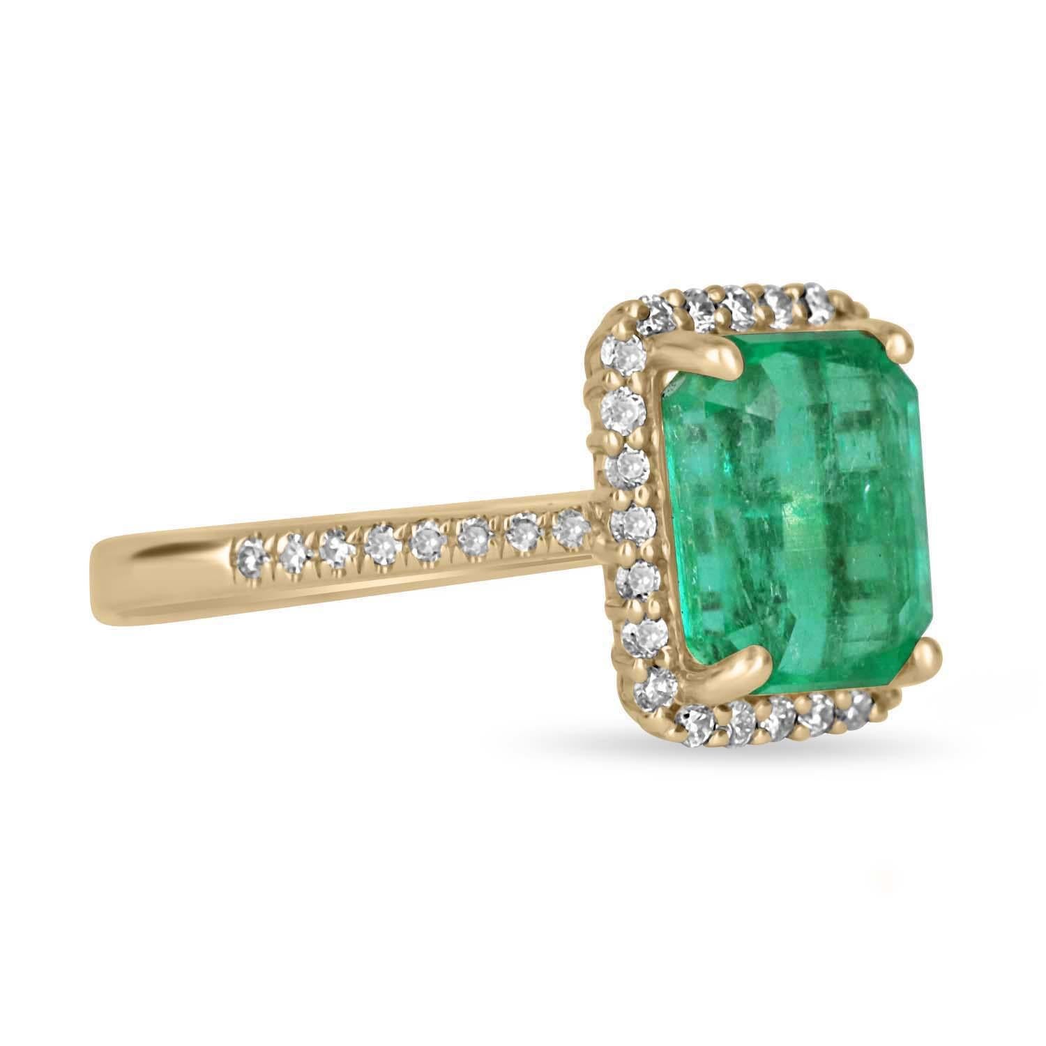 The perfect emerald and diamond halo engagement ring! The center stone showcases a full 2.80-carat Colombian emerald-emerald cut. This emerald displays a gorgeous medium green color, and perfectly imperfect imperfections within this natural