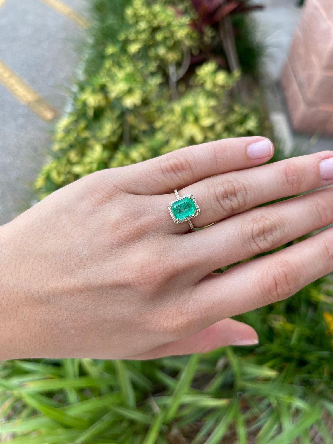 3.0tcw 14K Emerald Cut Emerald & Diamond Halo Ring In New Condition In Jupiter, FL
