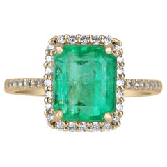 3.0tcw 14K Emerald Cut Emerald & Diamond Halo Ring