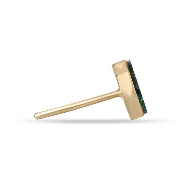 Experience unparalleled rarity and natural beauty with our exquisite Colombian emerald trapiche sliced cut earrings, a coveted style showcasing the mesmerizing patterns of nature's artistry. Weighing approximately 3 carats in total, these earrings