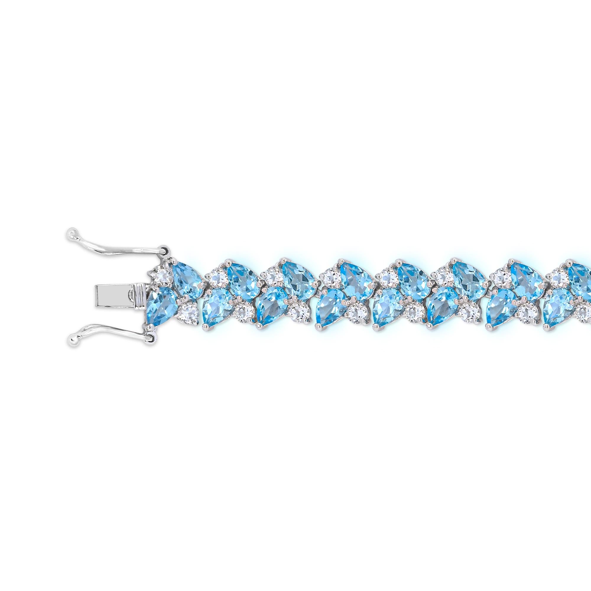 Pear Cut 31-1/2 ct. Swiss Blue and White Topaz Sterling Sliver Bracelet  For Sale