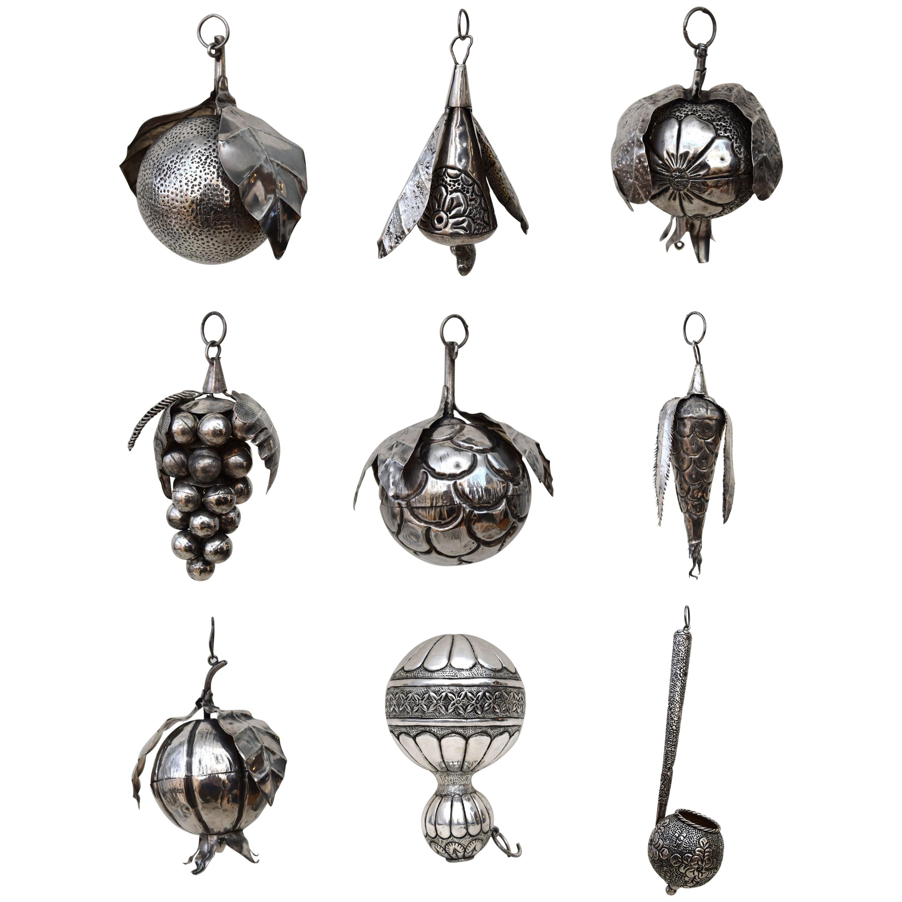 These 31 Brazilian amulets, or balangada, were hammered from sheets of silver in the 19th century to form pomegranates, sugar apples, guava, and other exotic fruits. Symbols of fertility, they were the bling of their day, adorning the wrists and