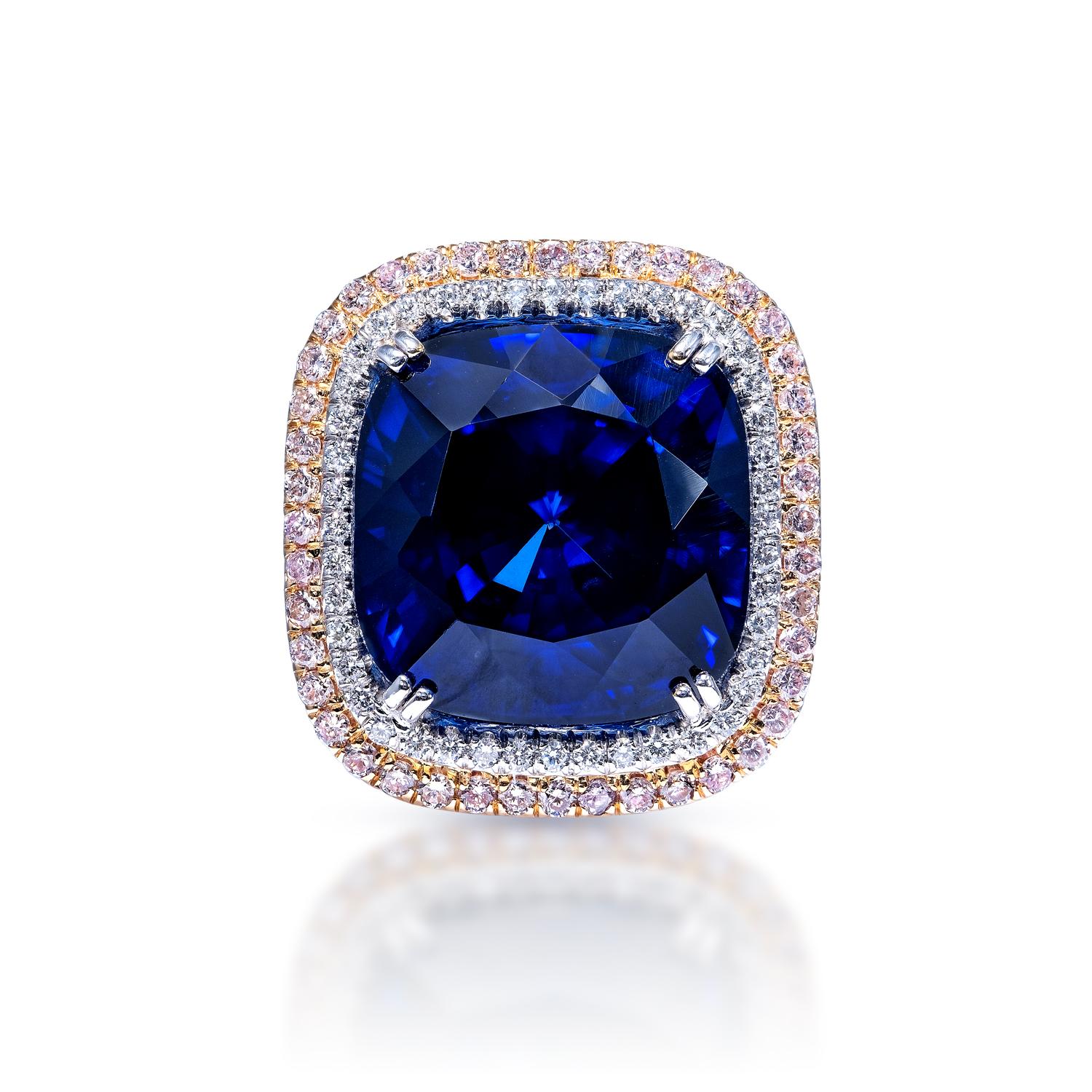 EGL Certified

Center Stone Sapphire Ring:
Carat Weight: 29.85 Carats
Color: Blue Sapphire - Diffused J’adore Sapphire
Style: Cushion Cut

Inner Halo:
Carat Weight: 1.00 Carats
Shape: Round Brilliant Cut

Outer Halo:
Carat Weight: 0.86 Carats
Color: