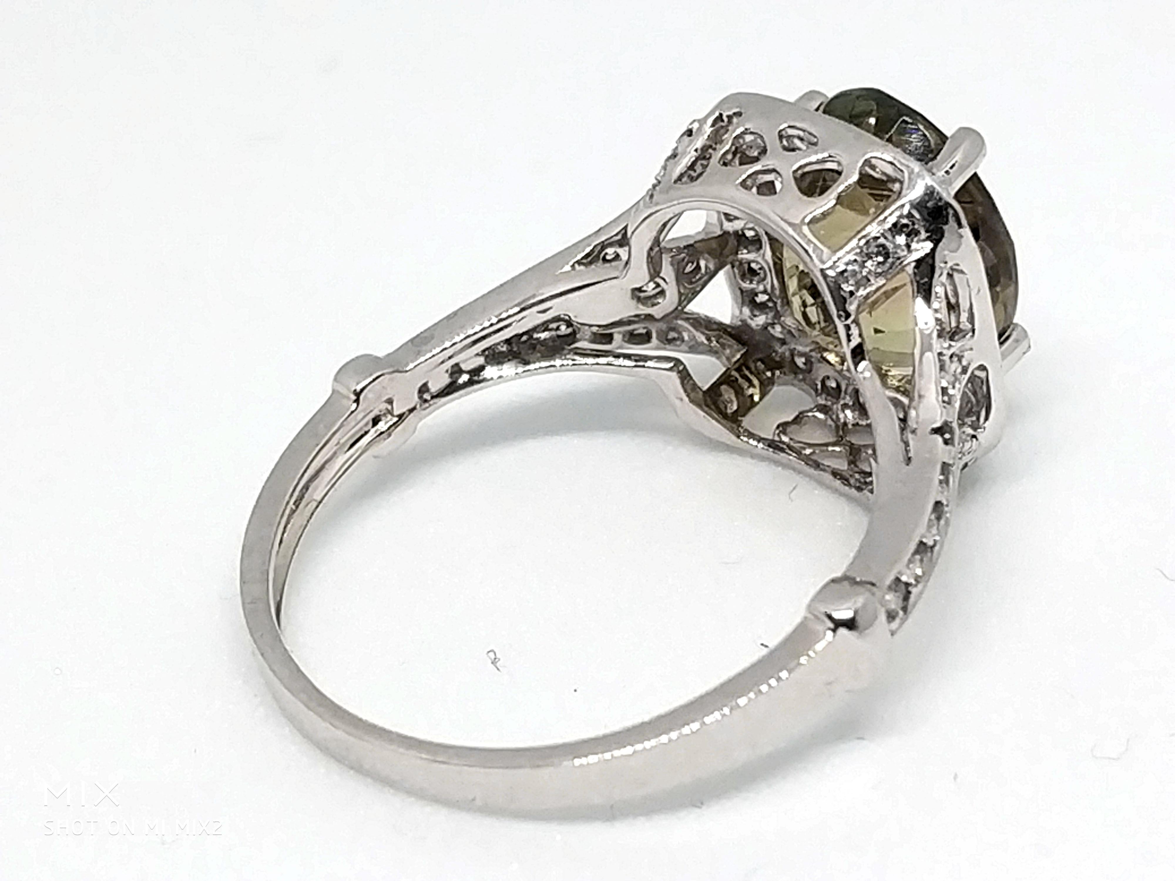 Art Deco 3.1 Carat Green Tourmaline and 1.5 Carat Diamond Ring For Sale