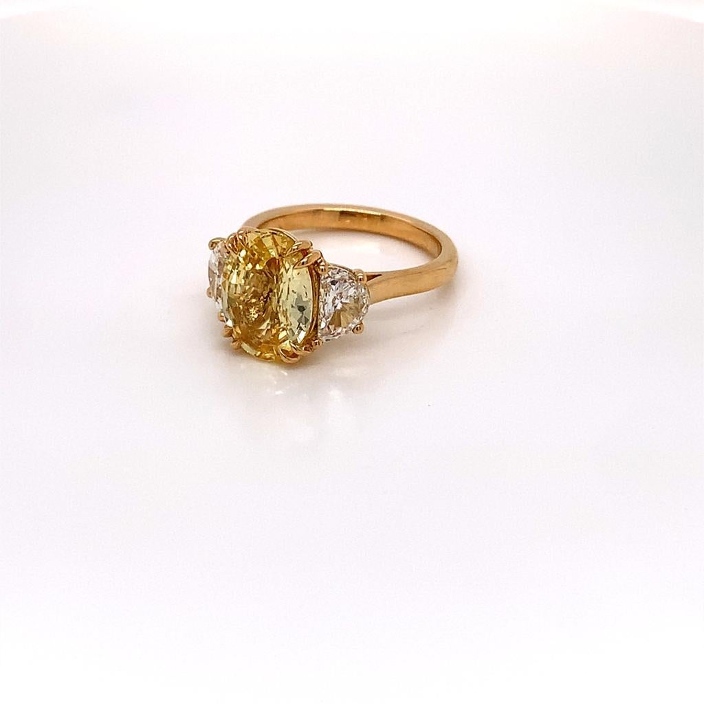 Women's 3.1 Carat Oval Cut Unheated Yellow Sapphire and Diamond Ring in 18K Yellow Gold For Sale
