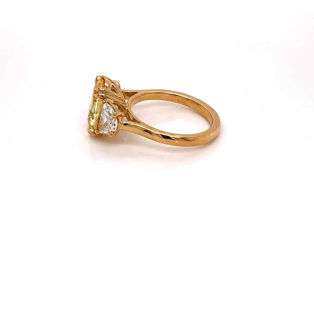 Women's 3.1 Carat Oval Cut Unheated Yellow Sapphire and Diamond Ring in 18K Yellow Gold For Sale