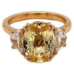 3.1 Carat Oval Cut Unheated Yellow Sapphire and Diamond Ring in 18K Yellow Gold