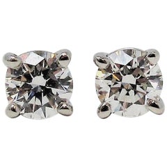 boucles d'oreilles en platine avec diamant solitaire rond et brillant de 31 carats:: Tiffany & Co