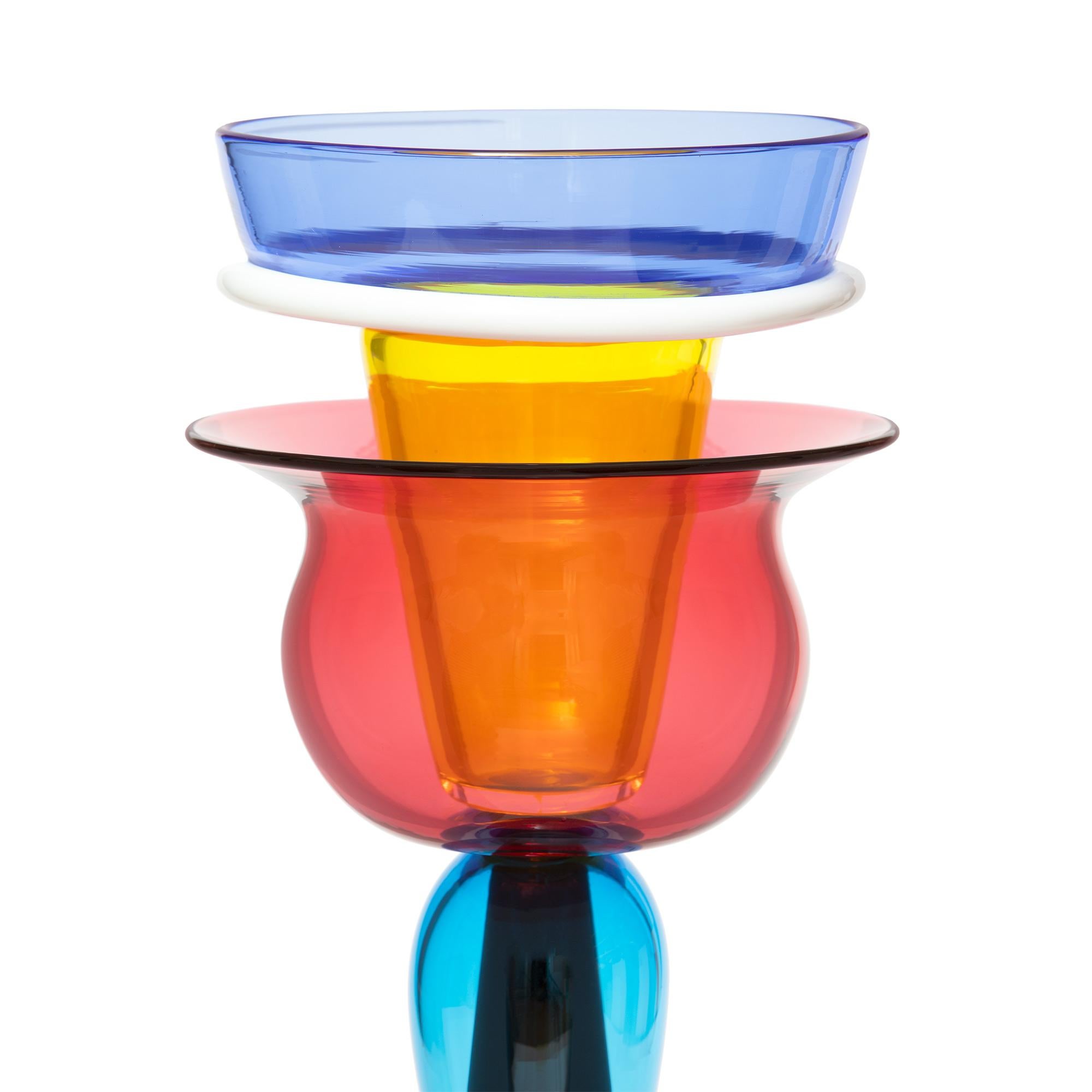 The Imera Glass Vase was originally designed by Ettore Sottsass in 1986. The vase is made out of blown glass, and signed on the base, for further information please see authenticity info below. 

Ettore Sottsass was born in Innsbruck in 1917. In