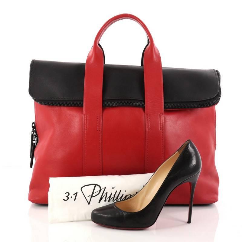 This authentic 3.1 Phillip Lim 31 Hour Fold-Over Tote Leather is a perfect minimalist everyday bag for modern fashionista. Constructed from red and black leather, this structured square tote features a fold over flap top that allows for expansion,