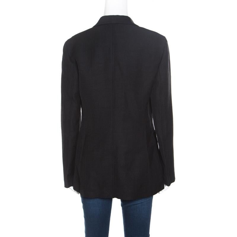 Every wardrobe deserves a good blazer and what better than this fabulous creation by 3.1 Phillip Lim! The black blazer is made of a jute and silk blend and features notched lapels, a double-breasted silhouette, front button fastenings, twin slip