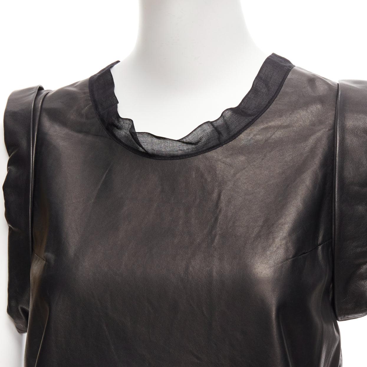 3.1 PHILLIP LIM black leather sheer silk trim folded sleeves tunic top US2 S
Reference: NILI/A00037
Brand: 3.1 Phillip Lim
Designer: Phillip Lim
Material: Leather, Silk
Color: Black
Pattern: Solid
Closure: Slip On
Lining: Black Silk
Extra Details: